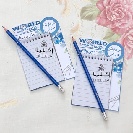 توزيعات نوت و قلم رصاص مع  ثيم ورقي عن اليوم العالمي للسكري ( 12 قطعه (