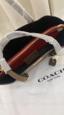 25 Moly coach