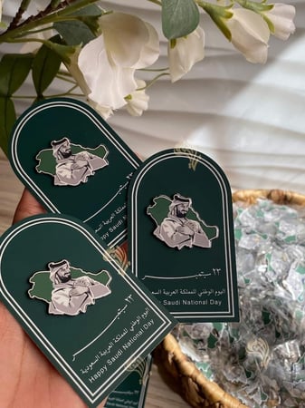 توزيعات اليوم الوطني السعودي بصوره الملك محمد بن سلمان
