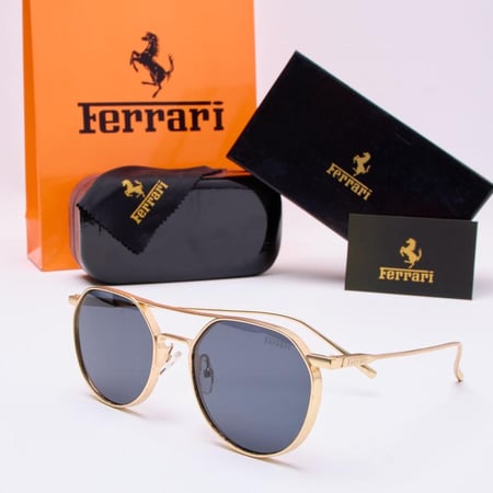 نظارة كحلي ماركة فراري مع العلبه والكيس وقطعه القماش والكرت فراري