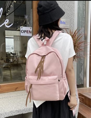 شنطة ظهر وردي