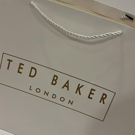 كيس تيد بيكر الطباعه - ابيض