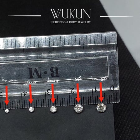 زمام بيرسينج ذهب عيار 18K بفص شفاف لامع كبير