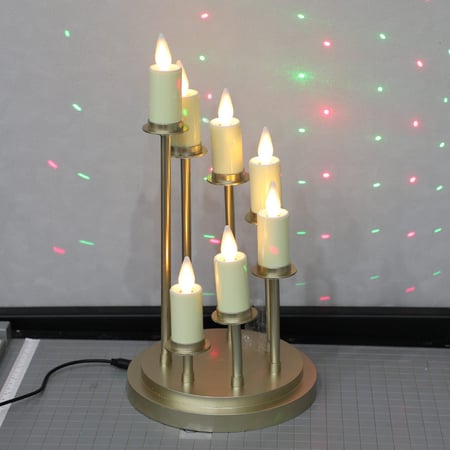 شموع مضيئ مع قاعدة 7 حبات
