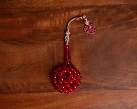 مسباح بكلايت احمر شفاف