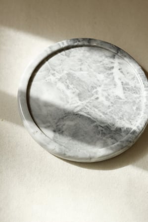 صينية تخزين رخامية مستديرة