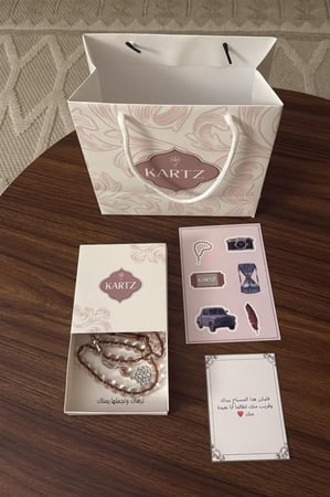 مسبحة KARTZ بني بشفاف