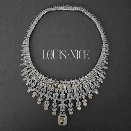 طقم زركون باللون الفضي والاصفر بدقة الألماس