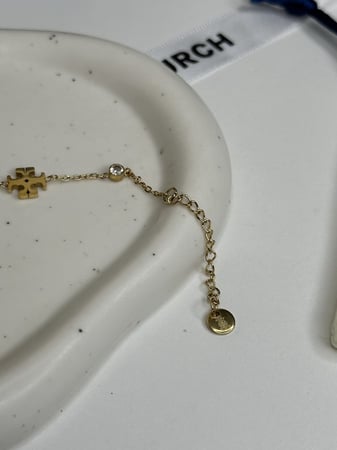 إسوارة TORY BURCH معدن ذهبي