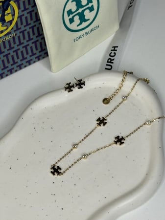 سلسال TORY BURCH معدن ذهبي