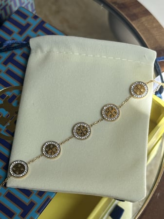 إسوارة TORY BURCH معدن ذهبي