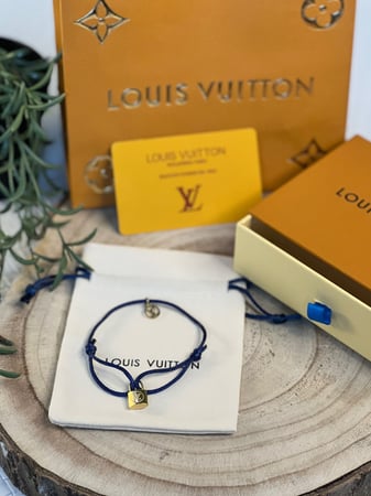 اسوارة لويس فيتون ذهبي