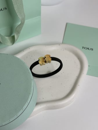 إسوارة توس أسود ذهبي