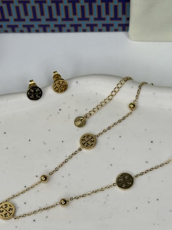 سلسال TORY BURCH معدن ذهبي