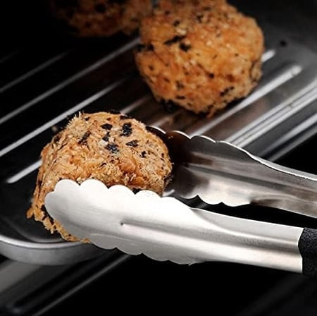 ملقاط استيل يد اسود