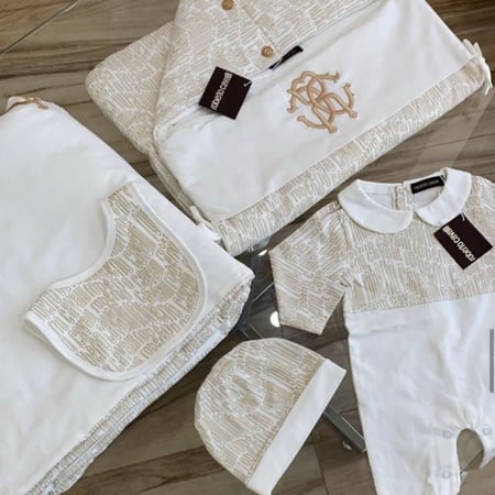 طقم روبرتو كفالي 5قطع+كيس الماركه