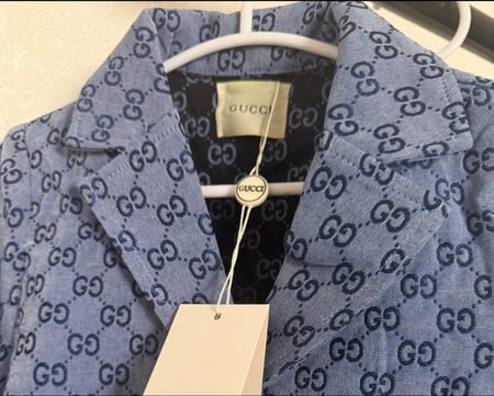 بدلة قوتشي ولادي رسمية