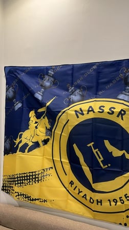 علم النصر بطل الدوري