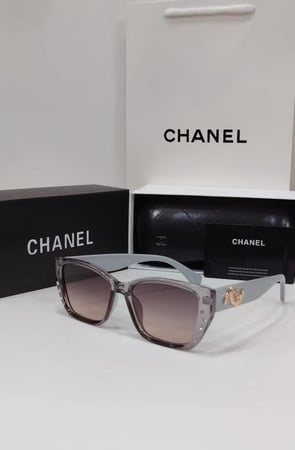 نظارة شانيل – إطار رمادي مع عدسات بنية متدرجة