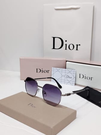 نظارة ديور فاخرة بإطار معدني أنيق وعدسات بنفسجية متدرجة 21