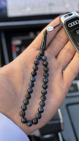 ميدالية نحت / كحلي مموَّج