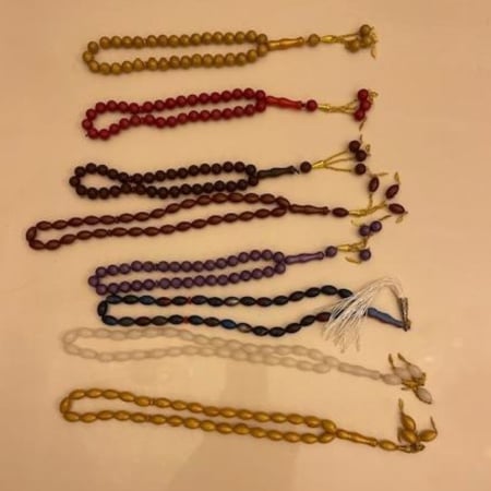 درزن سبح 12 حبة بلاستيكية