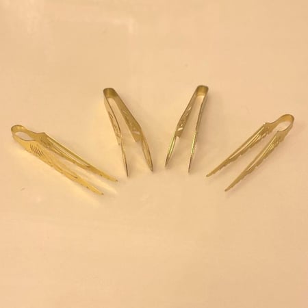 ملقاط الثلج او البخور والفحم