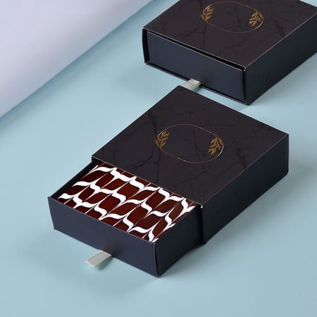 مجموعة 12 علبة كحلية بإطار ذهبي