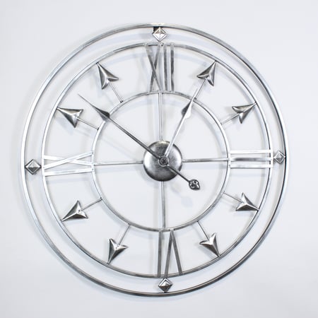 ساعة حائط دائرية لون فضي