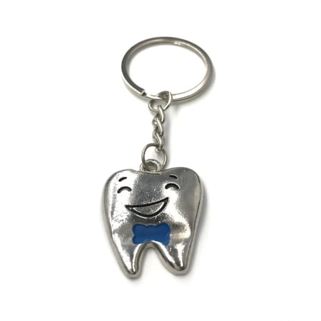 ميدالية مفاتيح معدنية على شكل سن