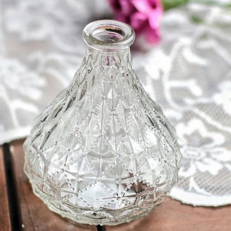 مزهرية زجاجية صغيرة شفافة بتصميم عتيق وملمس محكم | 3 قطع