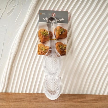 قالب اكليريك لتشكيل المعمول والبسكويت بتصميم بيضاوي مميز باللون الشفاف