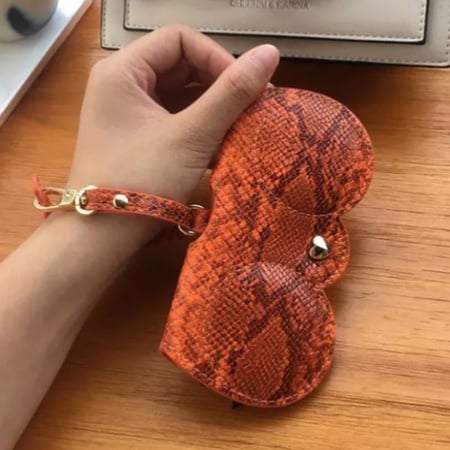 حافظة نظارات جلد ثعبان برتقالي