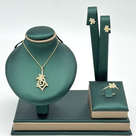 نصف طقم ذهب اصفر تصميم الماس عيار 18 من مجوهرات الشلوي