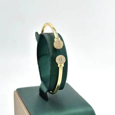 اسوارة ذهب اصفر تصميم الماس عيار 18 من مجوهرات الشلوي