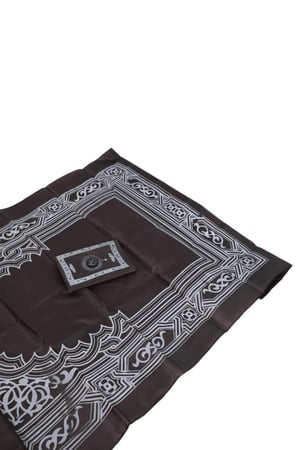 سجادة صلاة مع البوصلة
