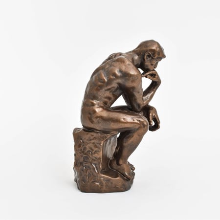 AUGUSTE RODIN; The Thinker sculpture