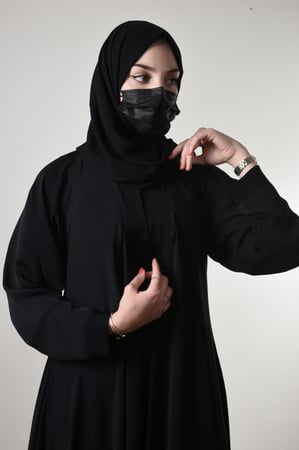 عباية كلوش سادة كم عادي