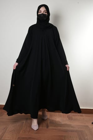 عباية كلوش سادة كم عادي