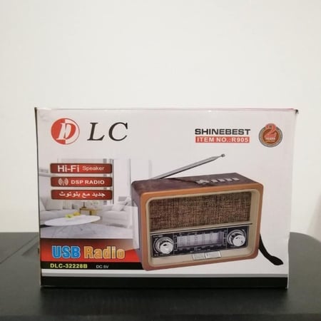 راديو زمان يدعم البلوتوث مزود بكشاف إضاءة و مدخل ذاكرة و aux و يو اس بي -  DLC-32228B