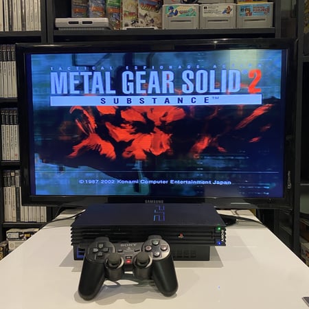 بلايستيشن 2 فات مع مجموعة العاب.(Playstation 2).