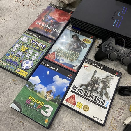 بلايستيشن 2 فات مع مجموعة العاب.(Playstation 2).