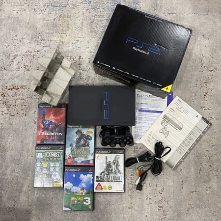بلايستيشن 2 فات مع مجموعة العاب.(Playstation 2).