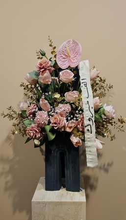 مزهريه ورد مُنسق بالزهور الصناعية