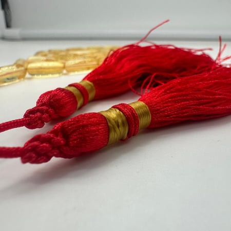 سبحة كهرمان بلطيقي شفاف قص صنوبري