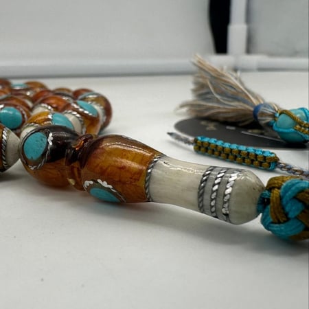 سبحة عظم جمل مطعم بالفضه 33 خرزه