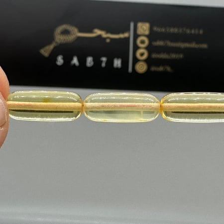 سبحة كهرمان بلطيقي شفاف قص صنوبري