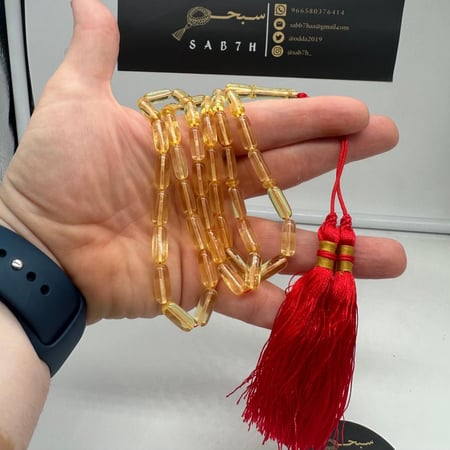 سبحة كهرمان بلطيقي شفاف قص صنوبري