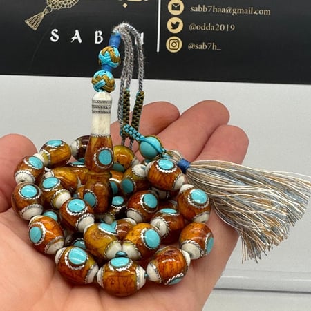 سبحة عظم جمل مطعم بالفضه 33 خرزه