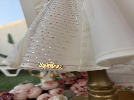 فستان للمواليد مزين بالترتر